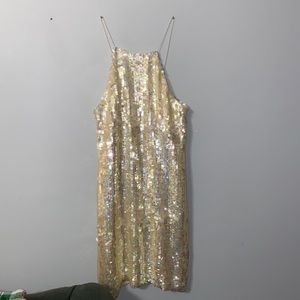 Silver sequin dress, no sequins missing. Mid thigh length, size 6/8.